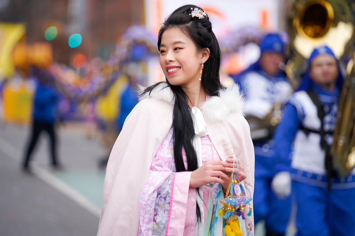 Falun Gong practitioners participate in the Chinese New Year Parade in Flushing, N.Y., on Jan. 21, 2023. (Samira Bouaou/The Epoch Times)