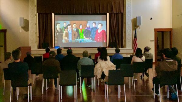 People watch “Eternal Spring” at a library in Milpitas, Calif., on Jan. 21, 2023. (Cynthia Cai/The Epoch Times)