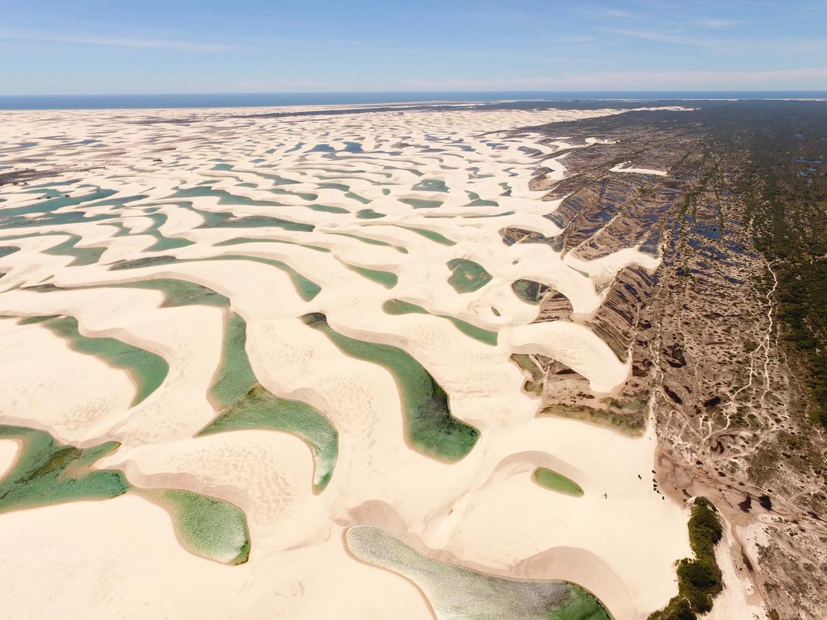 An aerial view of Lençóis Maranhenses shows sands that were gradually swept inland south from the shore. (Caio Pederneiras/Shutterstock)