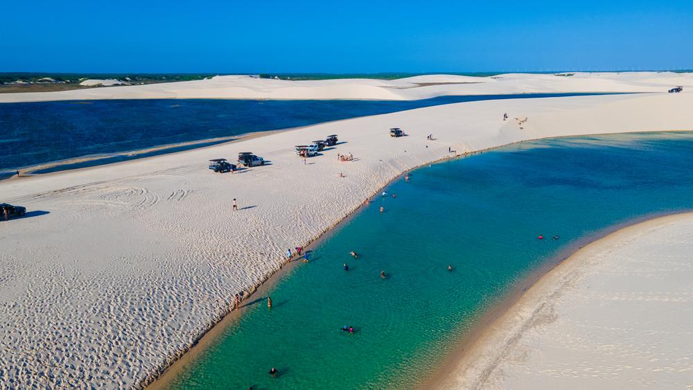 Lençóis Maranhenses, located about 50 minutes north of the municipality of Barreirinhas, is accessible via off-road vehicle. (guilhermespengler/Shutterstock)
