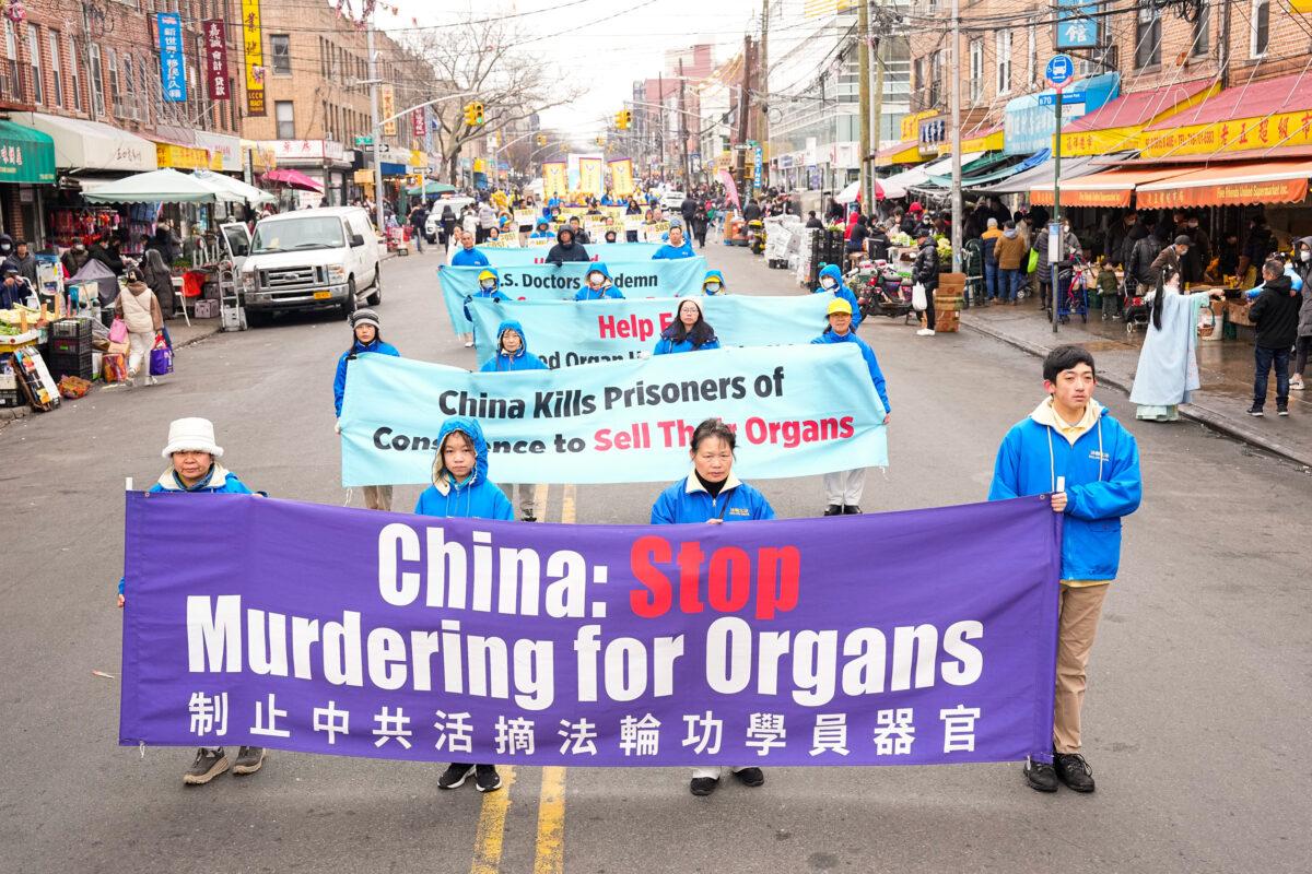 Falun Gong practitioners march in a parade in Brooklyn, N.Y., highlighting the Chinese regime's persecution of their faith on Feb. 26, 2023. (Larry Dye/The Epoch Times)