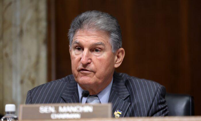 Manchin Presses Energy Secretary Over Changes to EV Tax Credit Policy