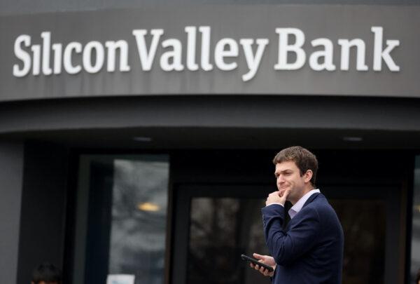 A customer stands outside the headquarters of the shuttered Silicon Valley Bank (SVB) in Santa Clara, Calif., on March 10, 2023. (Justin Sullivan/Getty Images)