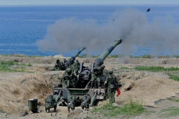 Two 8-inch self-propelled artillery guns are fired during the 35th "Han Kuang" (Han Glory) military drill in southern Taiwan's Pingtung county on May 30, 2019. (Sam Yeh/AFP via Getty Images)