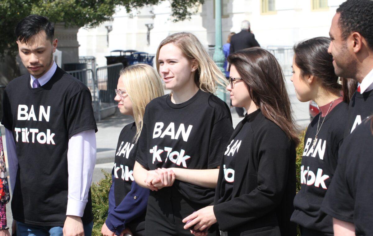 Anti-TikTok campaigners on Capitol Hill in Washington on March 23, 2023. (Richard Moore/The Epoch Times)