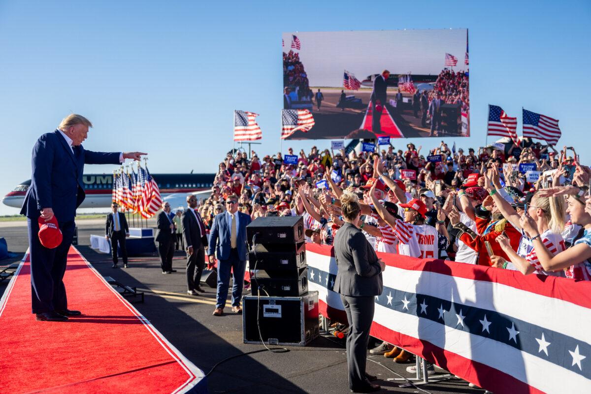 Former U.S. President Donald Trump arrives during a rally at the Waco Regional Airport in Waco, Texas, on March 25, 2023. (Brandon Bell/Getty Images)