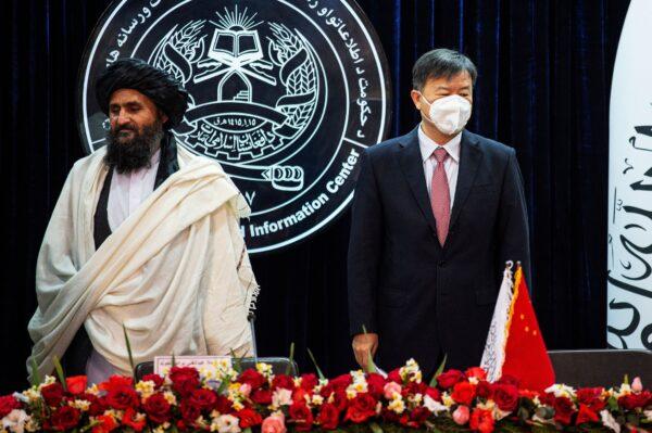 Afghan Acting Deputy Prime Minister Abdul Ghani Baradar (L) and China's ambassador at Kabul, Wang Yu, in Kabul, Afghanistan, on Jan. 5, 2023. (Ahmad Sahel Arman/AFP via Getty Images)
