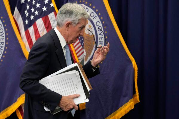 Federal Reserve Board Chair Jerome Powell walks away after speaking at a press conference at the Federal Reserve on March 22, 2023, in Washington. (Alex Brandon/AP)