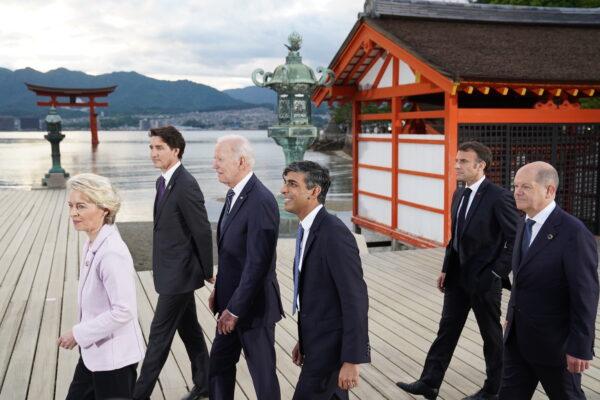 European Commission President Ursula von der Leyen, Canadian Prime Minister Justin Trudeau, U.S. President Joe Biden, UK Prime Minister Rishi Sunak, French President Emmanuel Macron, and German Chancellor Olaf Scholz arrive for the family photo at the Itsukushima Shrine during the G7 Summit in Hiroshima, Japan, on May 19, 2023. (Stefan Rousseau - Pool/Getty Images)