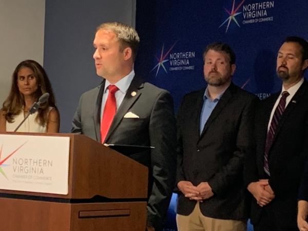 Virginia Attorney General Jason Miyares holds a press conference at the Northern Virginia Chamber of Commerce Office to announce the 100% Business Alliance Against Trafficking, Senate Candidate Bill Wolf (R) Vienna Virginia, on Sept. 12, 2023. (Masooma Haq/The Epoch Times)
