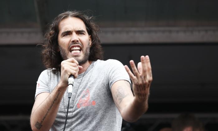 Russell Brand Gets Baptized in the River Thames