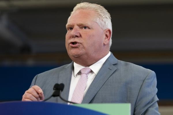 Ontario Premier Doug Ford delivers remarks at Lakeshore Collegiate Institute in Toronto, on Aug. 31, 2023. (The Canadian Press/Spencer Colby)