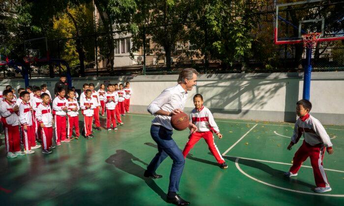 California’s Newsom Plays Hardball in China, Bowls Over Student During Schoolyard Basketball Game