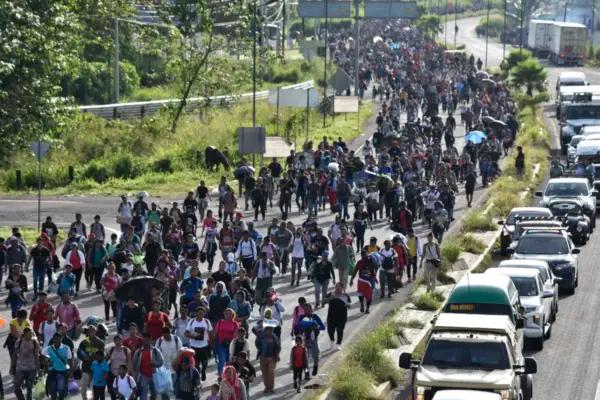 Migrants who had been waiting for temporary transit papers, but failed to get them after waiting, some up to two months, leave Tapachula, Mexico, on Oct. 30, 2023, as they make their way to the U.S. border. (Edgar Clemente/AP Photo)