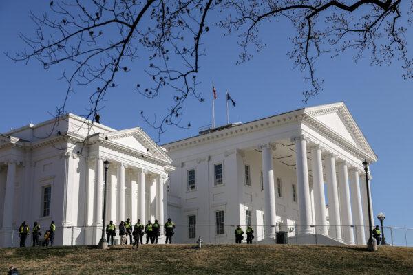 Virginia State Police stand guard after gun rights advocates took part in a rally at the Virginia State Capitol in Richmond, Va., on Jan. 20, 2020. (Samira Bouaou/The Epoch Times)