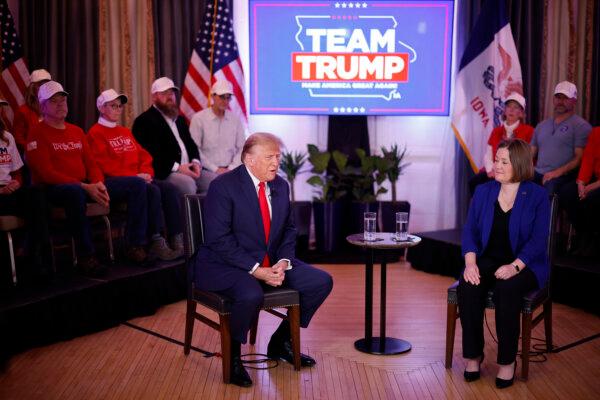 Republican presidential candidate, former U.S. President Donald Trump and Iowa Attorney General Brenna Bird participate in a "telerally" at the Hotel Fort Des Moines on Jan. 13, 2024 in Des Moines, Iowa. (Chip Somodevilla/Getty Images)