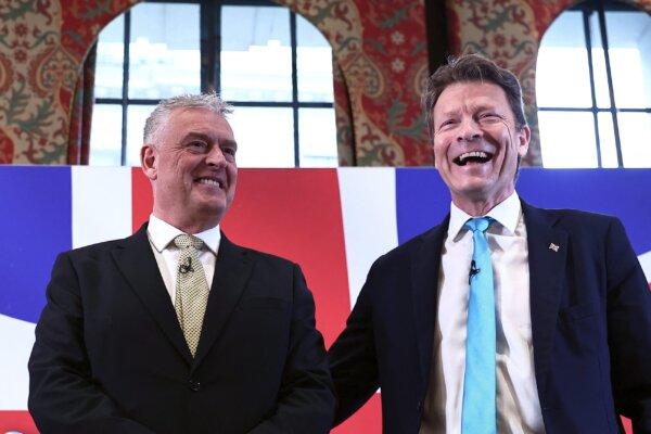 Former Conservative Deputy Chairman Lee Anderson (L) and leader of Reform UK Richard Tice (R) answer questions following a press conference to announce his defection from the Conservative Party to Reform UK, in London, on March 11, 2024. (Henry Nicholls/AFP via Getty Images)