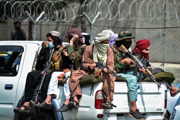 Members of the Taliban outside the airport in Kabul after the U.S. withdrawal in Afghanistan, on Aug. 31, 2021. (Wakil Kohsar/AFP via Getty Images)