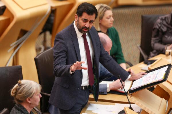 Scottish First Minister Humza Yousaf reacts as he answers questions during First Minister's Questions at Scottish Parliament in Edinburgh, Scotland, on March 21, 2024. (Jeff J Mitchell/Getty Images)