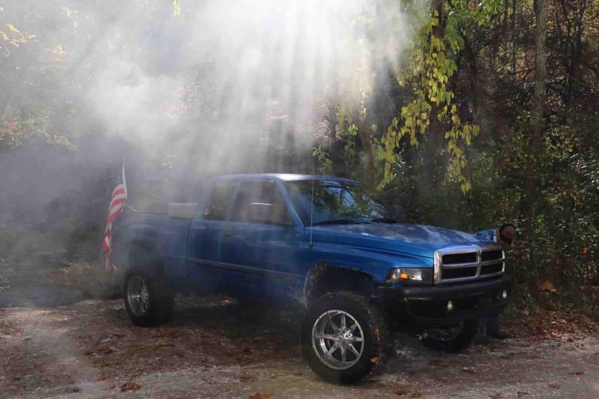 Cameron Blasek's truck flying an American flag. (Courtesy of <a href="https://www.facebook.com/heidi.blasek">Heidi Jo Jackson-Blasek</a>)