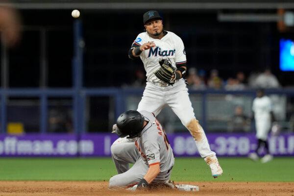 Weathers strikes out a career-high 10 as Marlins rally to beat Giants
