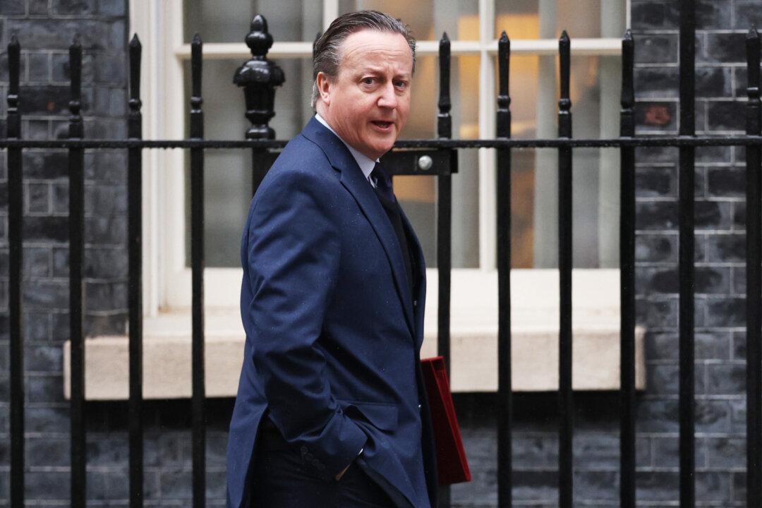 Cameron Summons Chinese Ambassador After Researcher Charged With Spying