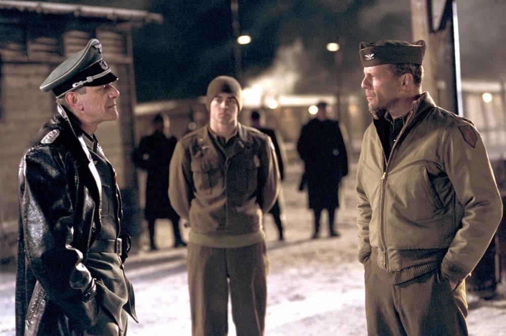 (L–R) POW commander Werner Visser (Marcel Iures), Lt. Thomas Hart (Colin Farrell), and Col. William McNamara (Bruce Willis), in “Hart’s War.” (Metro-Goldwyn-Mayer)