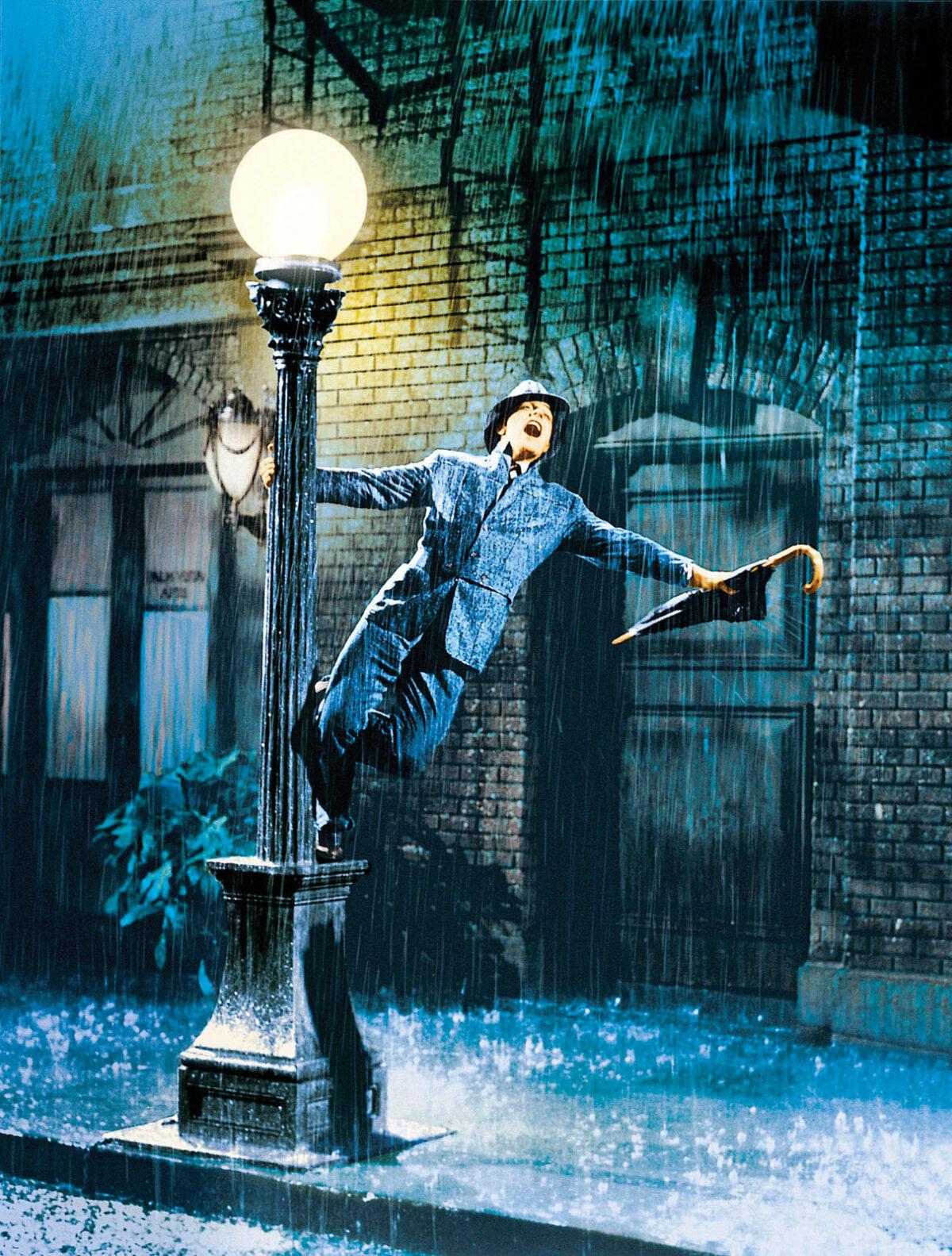 Don Lockwood (Gene Kelly) sings in the memorable sequence, in "Singin' in the Rain." (Metro-Goldwyn-Mayer)