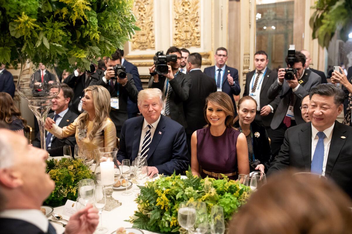 President Donald Trump, with First Lady Melania Trump, and Chinese leader Xi Jinping at the G20 Buenos Aires summit in November 2018. (Public Domain)