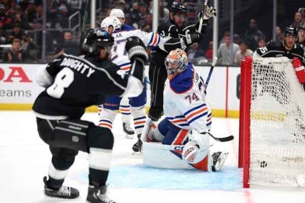 Stuart Skinner (74) of the Edmonton Oilers is unable to stop a goal by Drew Doughty (8) of the Los Angeles Kings during the second period of Game Three of the First Round of the 2024 Stanley Cup Playoffs in Los Angeles on April 26, 2024. (Sean M. Haffey/Getty Images)