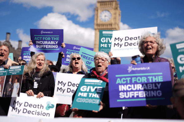 Campaigners protest outside Parliament ahead of a debate in the House of Commons on assisted dying in Westminster, London, on April 29, 2024. (Jordan Pettitt/PA Wire)