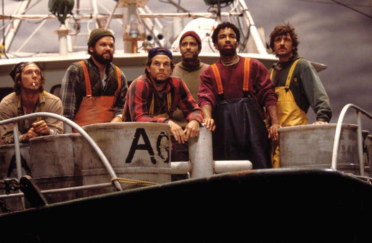 Crew of the Andrea Gail sets sail toward the perfect storm. (L–R) Sully Sullivan (William Fichtner), Dale Murphy (John C. Reilly), Bobby Shatford (Mark Wahlberg), Billy Tyne Jr. (George Clooney), Alfred Pierre (Allen Payne), and Bugsy Moran (John Hawkes), in “The Perfect Storm.” (Warner Bros.)
