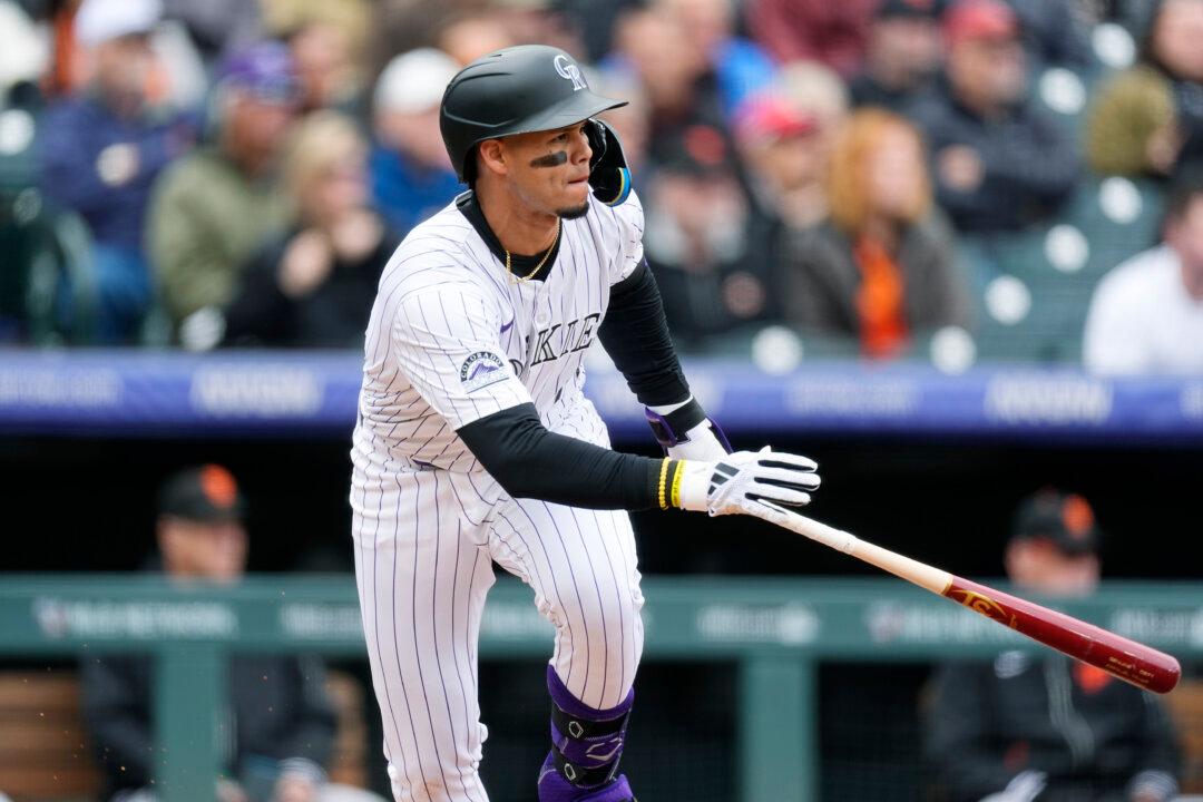 Lowly Rockies Score Seven in Fourth, Roll Past Giants to Avoid Sweep