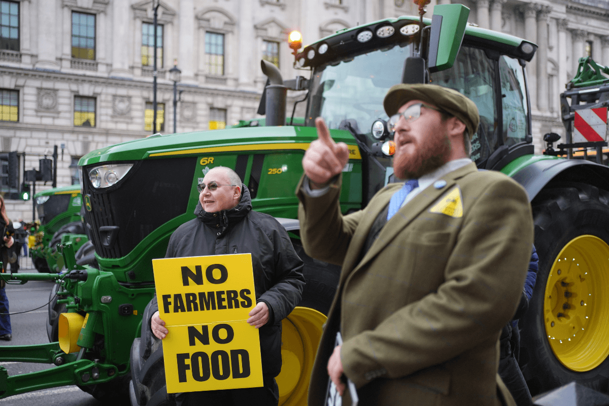 Tractors are parked on Whitehall in Westminster in protest by farmers over the changes to inheritance tax rules in London, on Dec. 11, 2024. (Yui Mok/PA Wire)