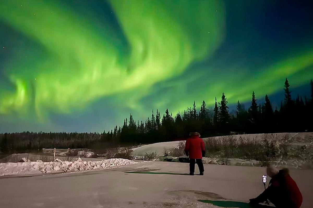A ribbon of green auroras appears on a cold day in early December. (Courtesy of Joe Buffalo Child)