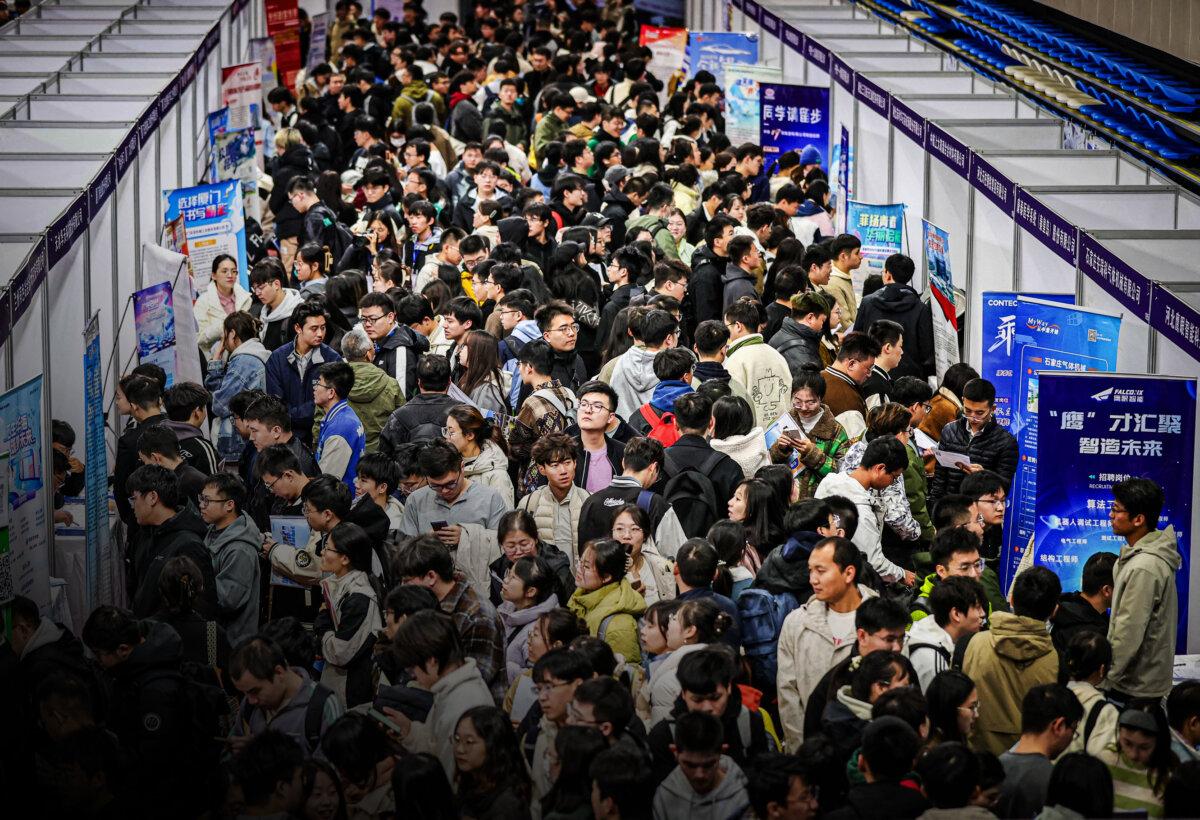 People attend a job fair in Shenyang, Liaoning Province, China, on Oct. 22, 2024. (STR/AFP via Getty Images)