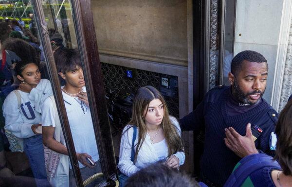 Students are evacuated from the Butler Library as a pro-Palestinian protest takes place at Butler Library on the campus of Columbia University in New York on May 7, 2025. (Ryan Murphy/Reuters)