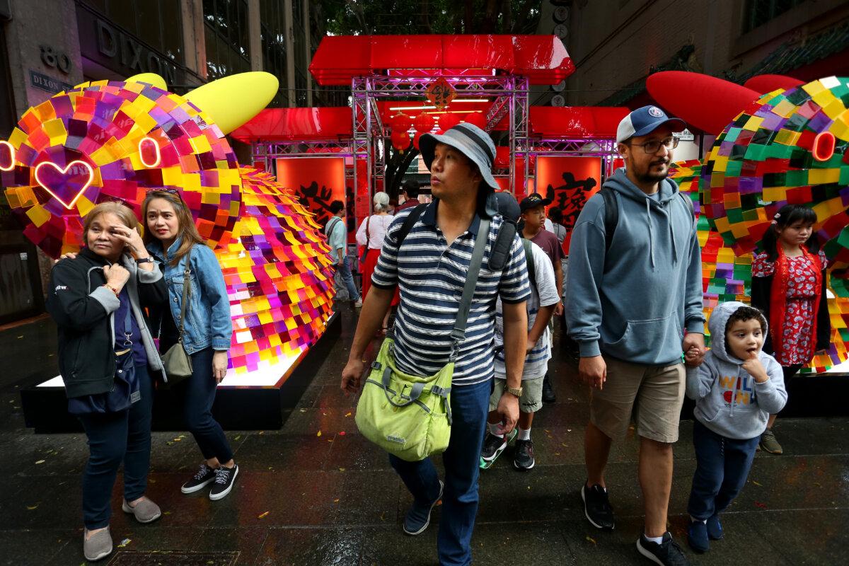 Crowds gather in the Chinatown district in Sydney, Australia, on Jan. 21, 2023. (Lisa Maree Williams/Getty Images)