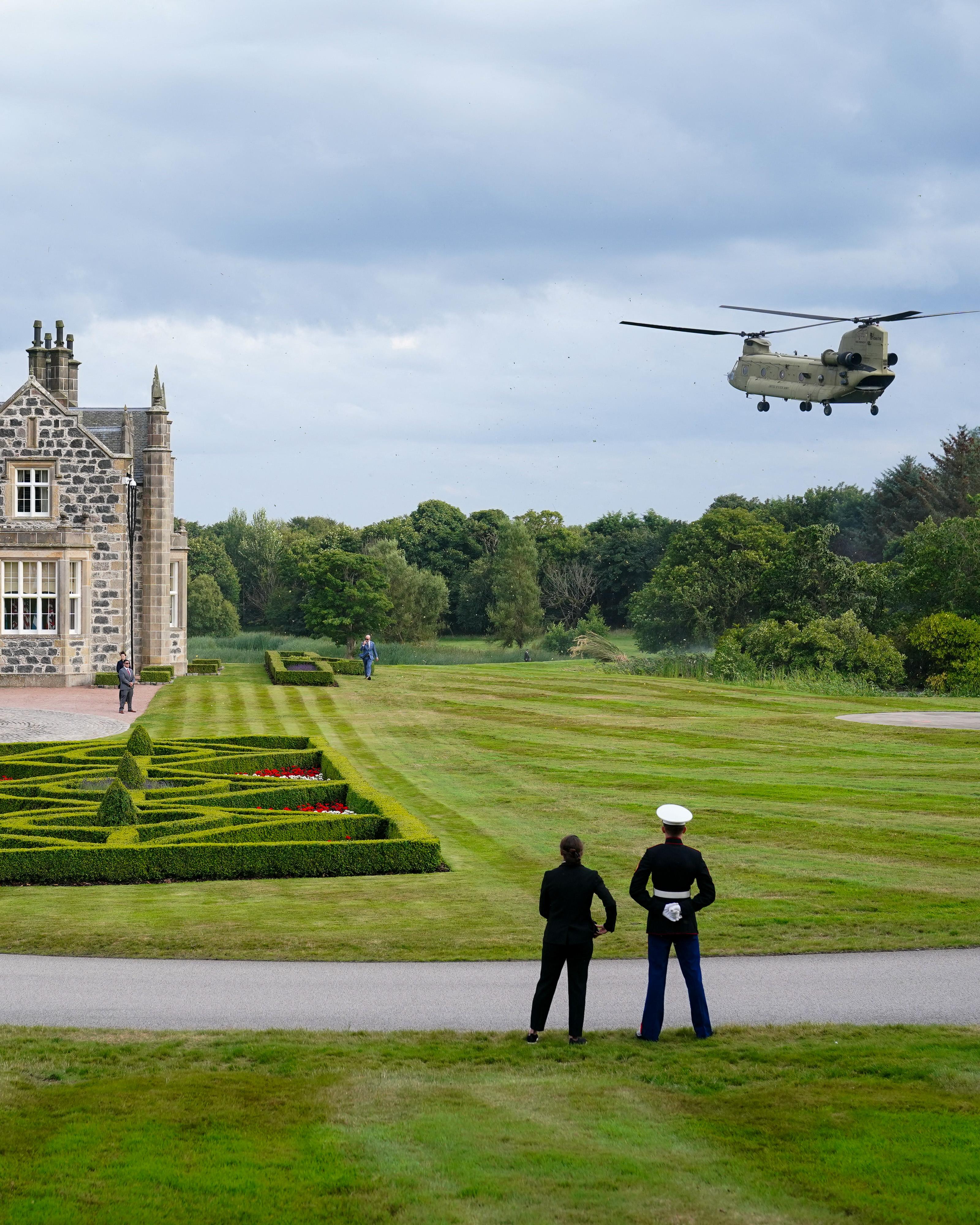 Day in Photos: Trump Visits Scotland, Train Accident in Germany, Protests in Indonesia
