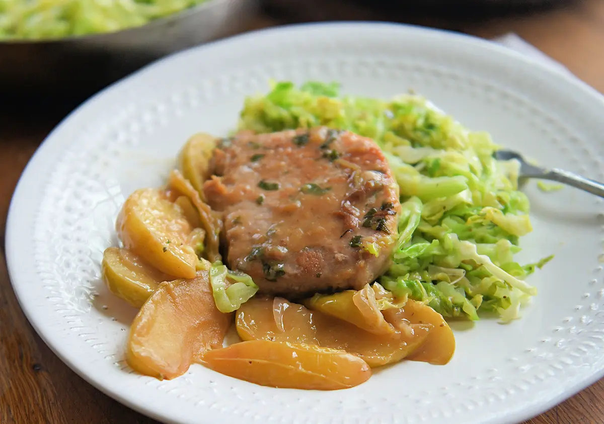One-Pot Recipe Brings Together Pork Chops, Apples, and Warm Cabbage Slaw