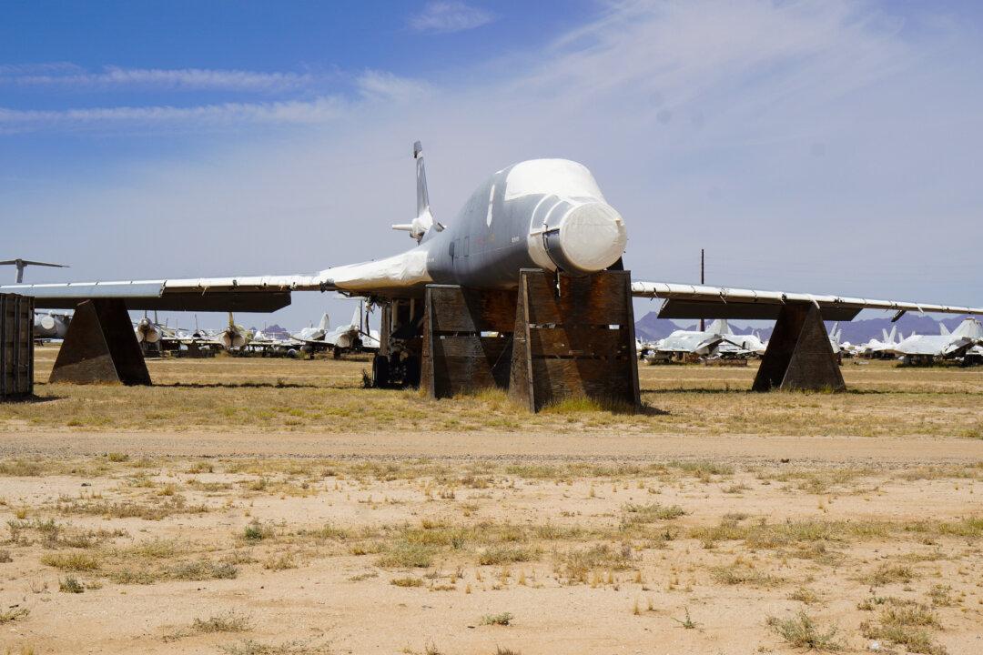 A B-1 bomber at the 309th Aerospace Maintenance and Regeneration Group “boneyard” in Tucson, Ariz., on April 21, 2026. Each aircraft at the boneyard is secured for long-term storage, drained of fluids, stripped of explosive components, and preserved against the slow wear of the desert. (Allan Stein/The Epoch Times)