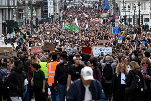 Day in Photos: Anti-Police Brutality Protest in Brussels, Earthquake in Philippines, and Africa Environmental Protest