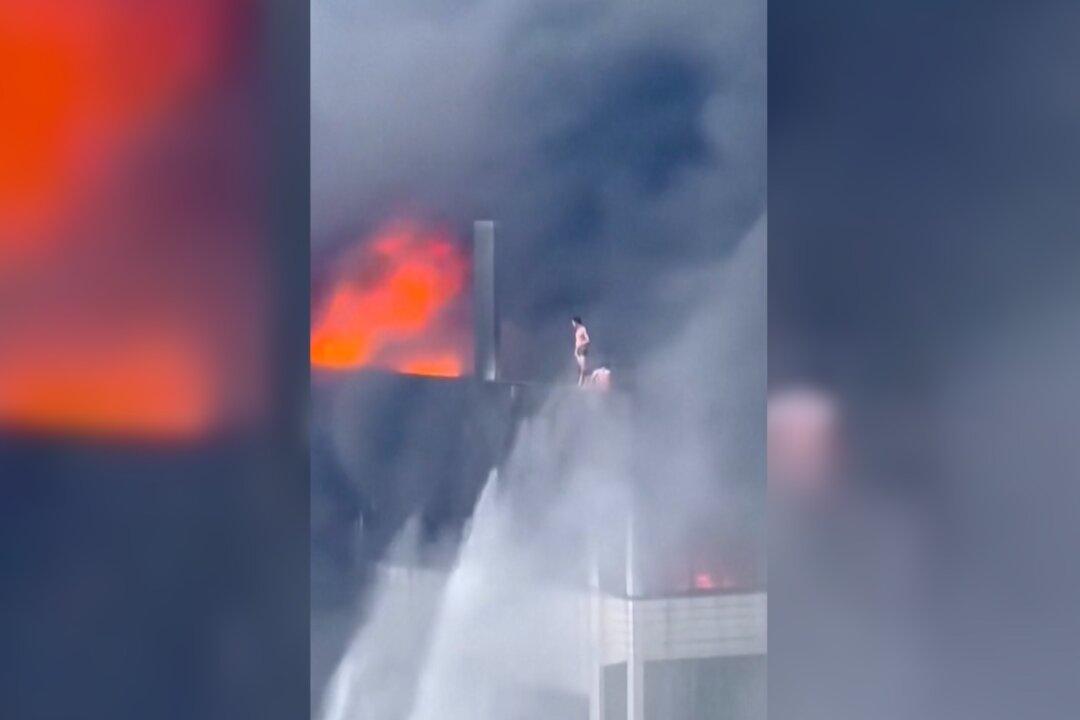 Deadly Fire Traps Workers on Roof in China