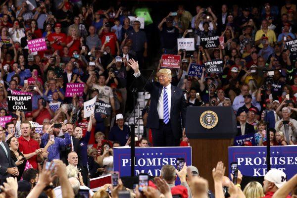 President Donald Trump speaks at a Make America Great Again rally in Charleston, W. Va., on Aug. 21, 2018. (Charlotte Cuthbertson/The Epoch Times)