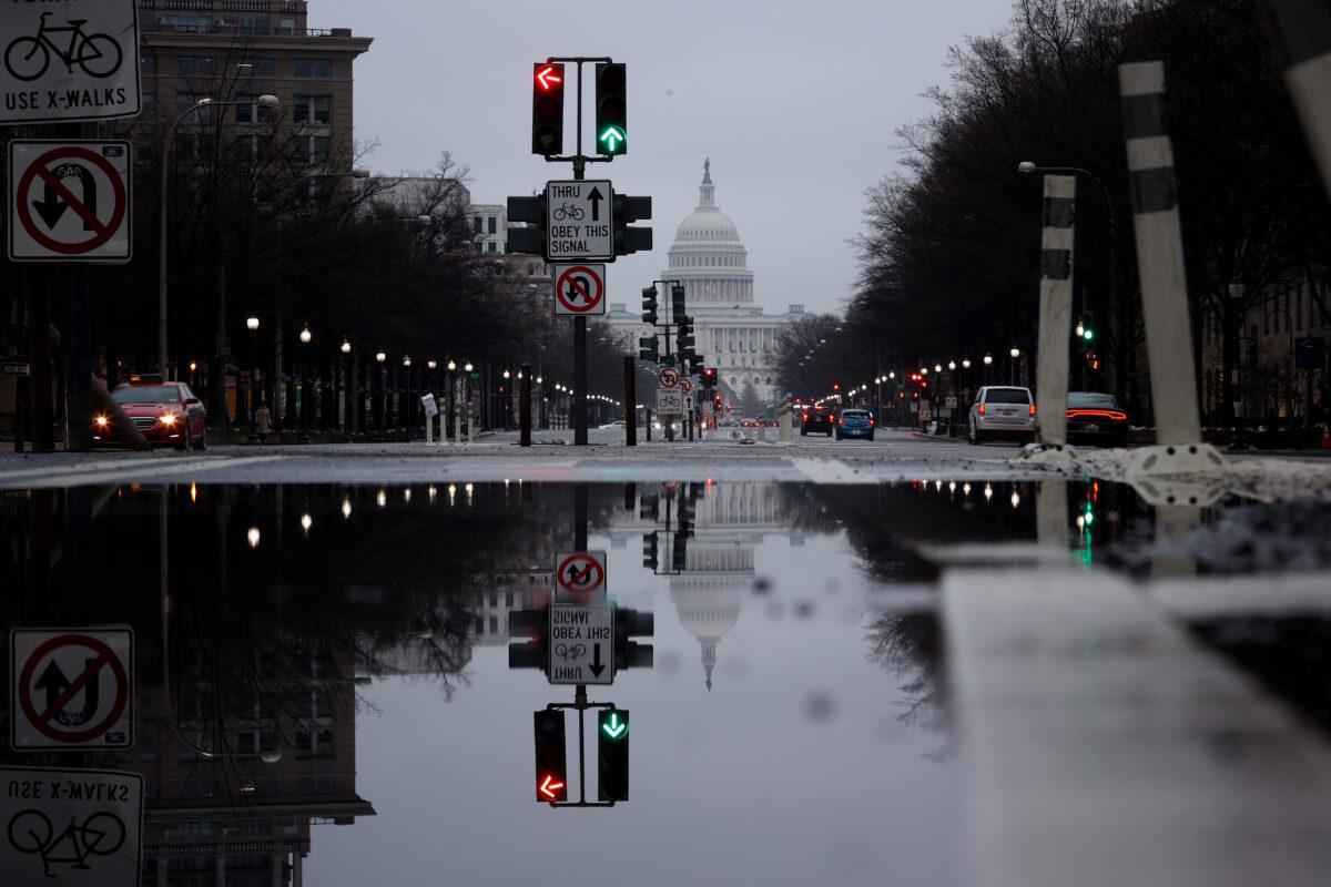 Pennsylvania Avenue, normally filled with commuters during morning rush hour, is shown nearly empty due to the impacts of coronavirus in Washington on March 19, 2020. Confirmed cases of the COVID-19 virus have reached nearly 10,000 in the United States with a reported 150 deaths having been recorded. (Win McNamee/Getty Images)
