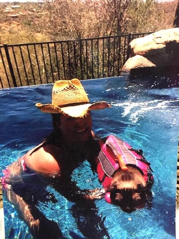 Feline Jack enjoyed swimming in the pool with his pet parent Tammy and going on long walks on a leash. (Courtesy photos)