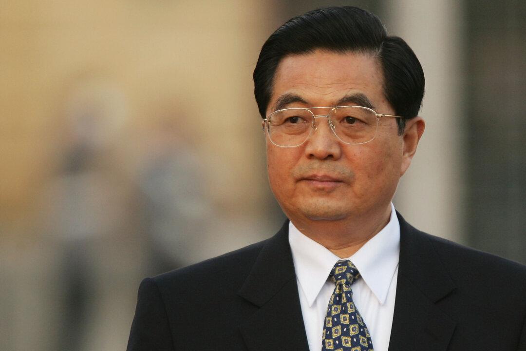 China’s Hu Eyes Promotions at Communist Meeting