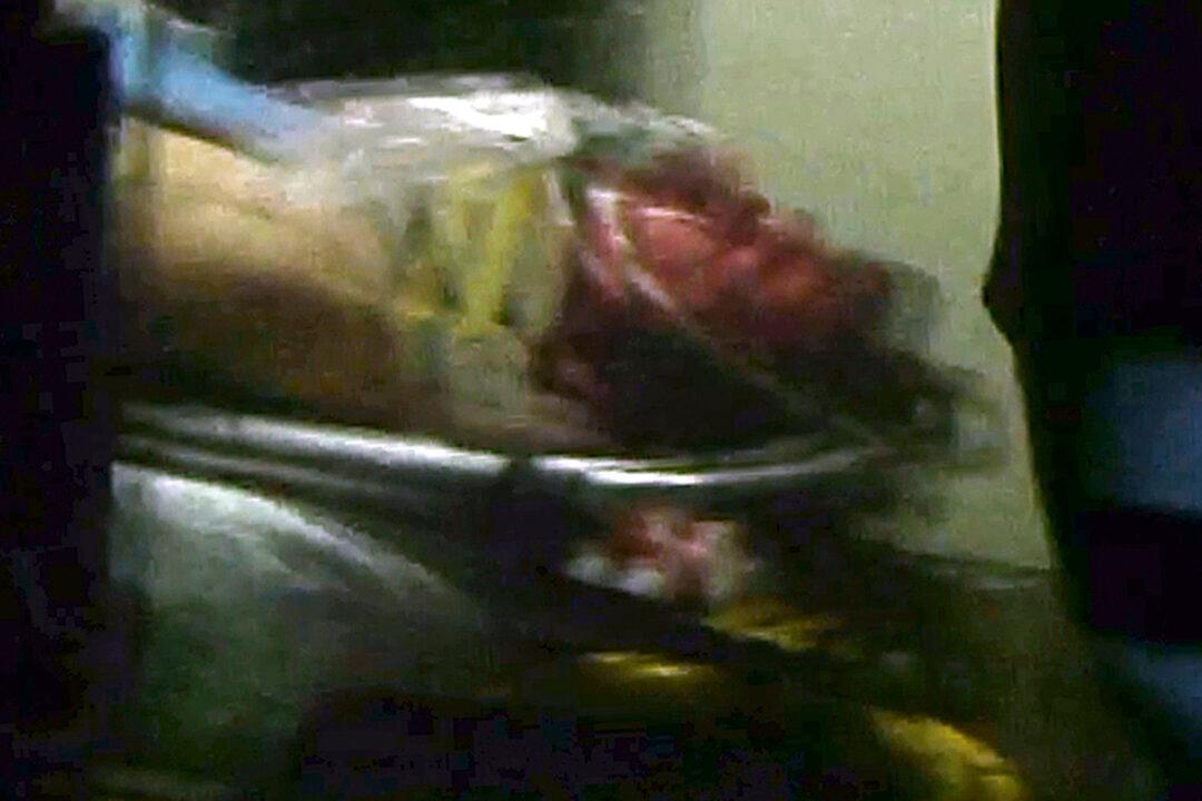 Boston Bomber Arrest Photo: New Ambulance Image of Suspect