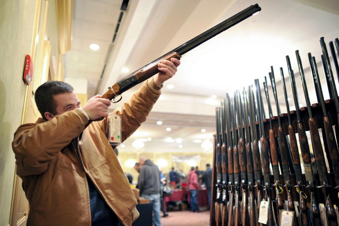 Gun Deal Calls for Tougher Background Checks