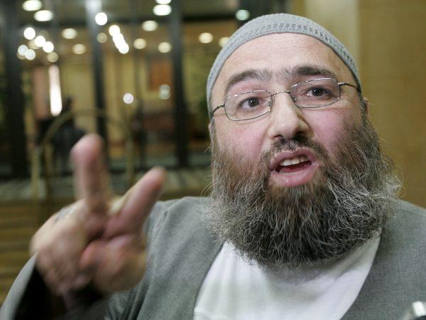 Muslim cleric Omar Bakri Mohammed gestures while talking to the media, in Beirut, Lebanon, on Sept. 5, 2005. (Hussein Malla, File/AP Photo)